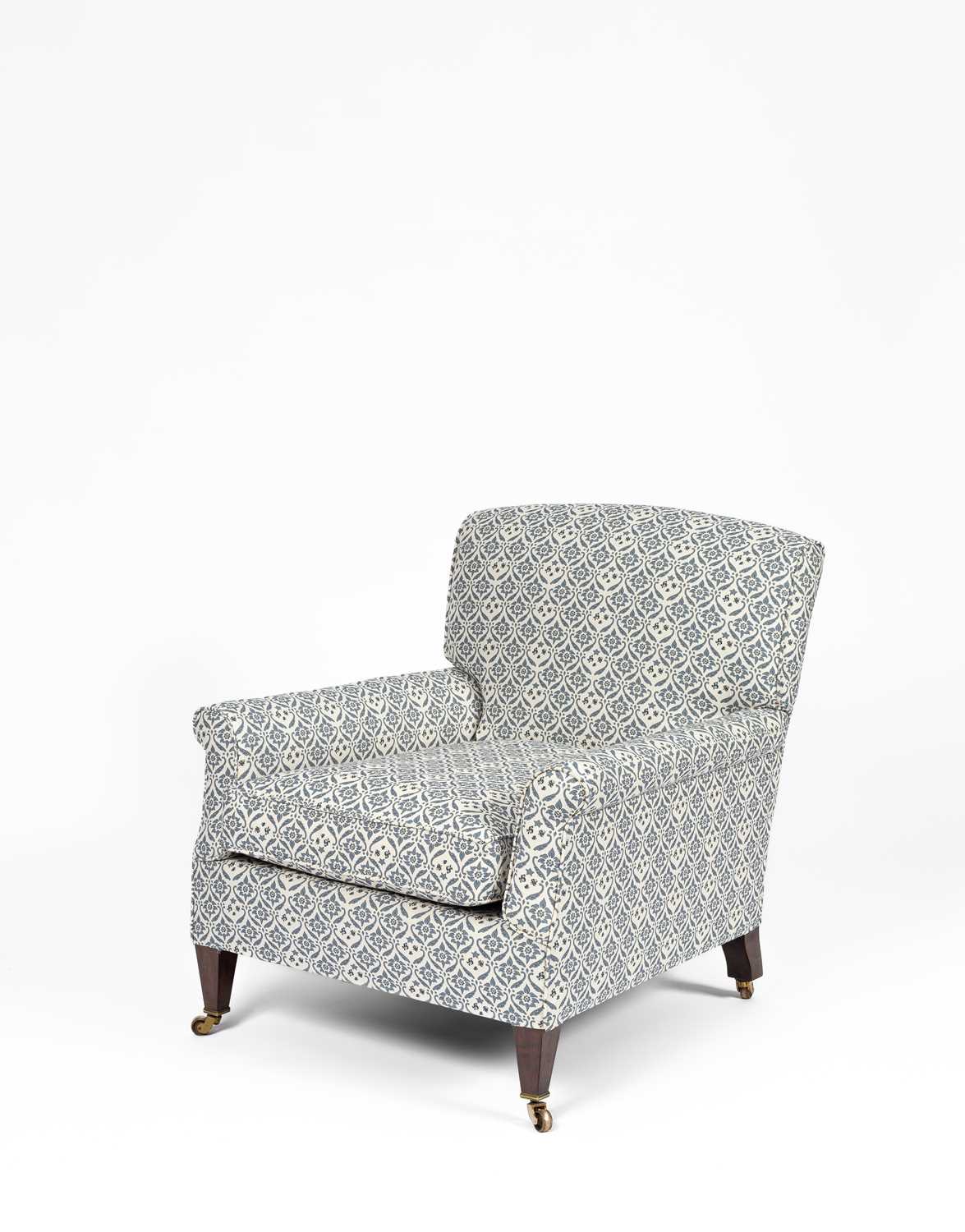 Lot 711 - A Howard & Sons armchair