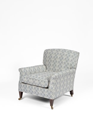 Lot 711 - A Howard & Sons armchair