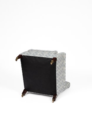Lot 711 - A Howard & Sons armchair