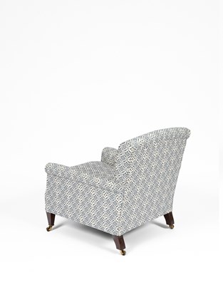 Lot 711 - A Howard & Sons armchair
