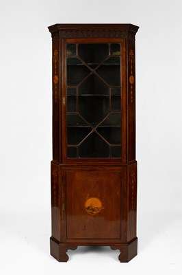 Lot 586 - An Edwardian mahogany and marquetry corner cupboard