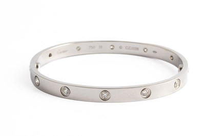 Lot 269 - Cartier - An 18k white gold and diamond love bracelet
