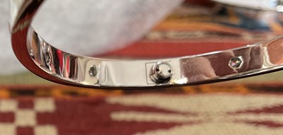 Lot 269 - Cartier - An 18k white gold and diamond love bracelet