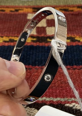 Lot 269 - Cartier - An 18k white gold and diamond love bracelet