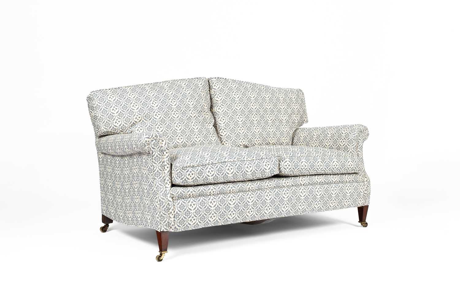 Lot 713 - A Howard & Sons sofa