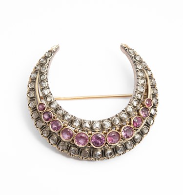 Lot 1 - A Victorian ruby and diamond crescent brooch
