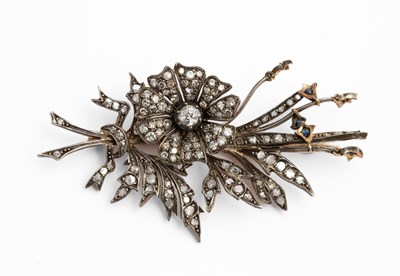 Lot 3 - A yellow metal and diamond floral spray brooch
