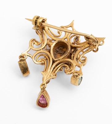 Lot 4 - A yellow metal gem set 'Regard' brooch