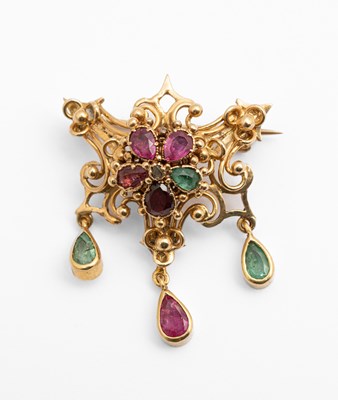 Lot 4 - A yellow metal gem set 'Regard' brooch