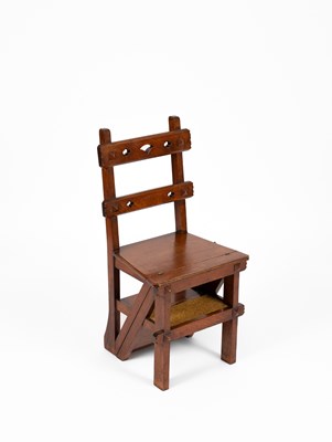 Lot 367 - An Arts & Crafts metamorphic oak library chair/steps