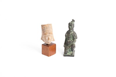 Lot 457 - A small Chinese bronze figure