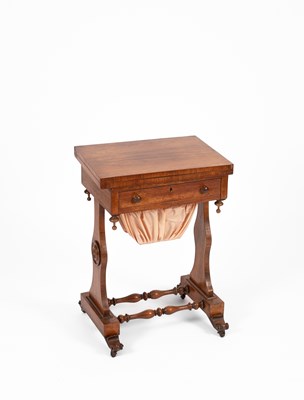 Lot 268 - A Victorian rosewood games/sewing table