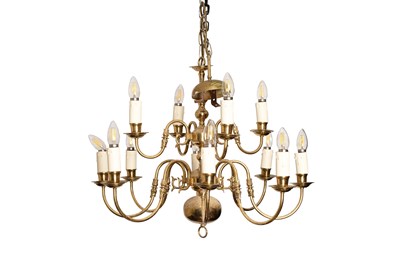 Lot 257 - A Dutch brass twelve-branch chandelier