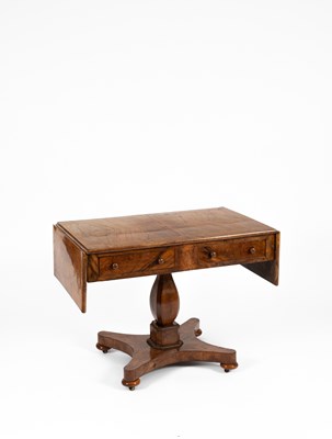 Lot 295 - An early 19th Century figured walnut sofa table