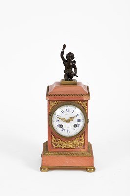 Lot 378 - A 19th Century French pink marble and gilt brass clock