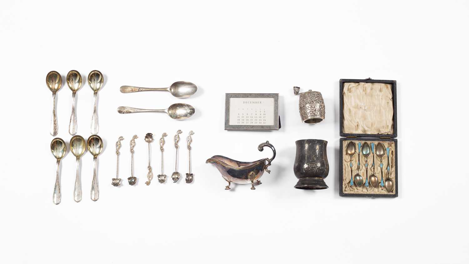 Lot 84 - A set of six Scandinavian silver and blue enamel teaspoons