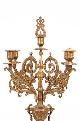 Lot 376 - A late 20th Century brass mantel clock garniture