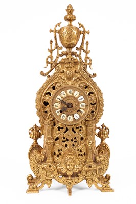 Lot 376 - A late 20th Century brass mantel clock garniture