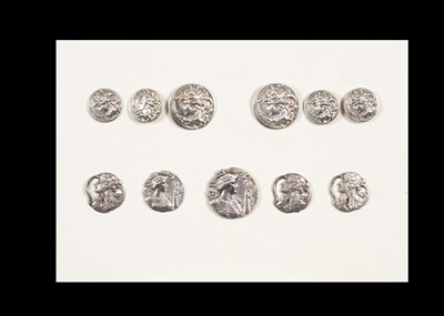Lot 200 - A group of eleven silver Art Nouveau circular buttons cast with female heads