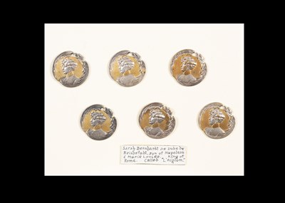 Lot 203 - A set of six white metal buttons depicting Sarah Bernhardt in the role of L'Aiglon