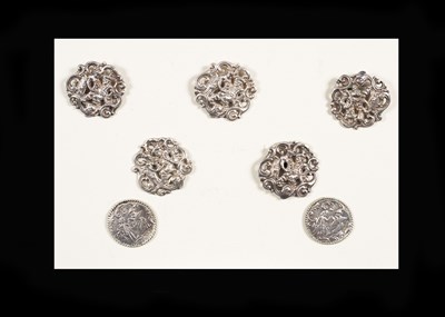 Lot 209 - A group of seven large silver buttons