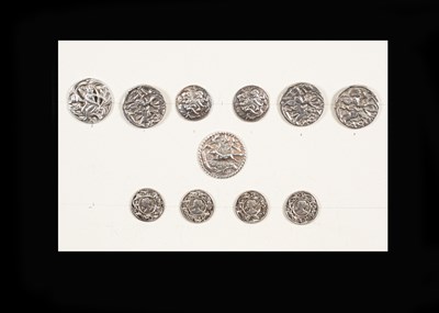 Lot 211 - A group of eleven silver buttons