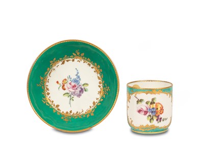 Lot 523 - A Sèvres style cup gobelet couvert and similar saucer
