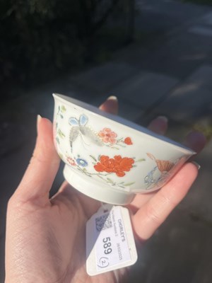 Lot 589 - A pair of famille rose tea bowls