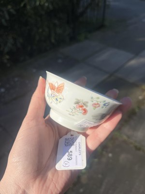 Lot 589 - A pair of famille rose tea bowls