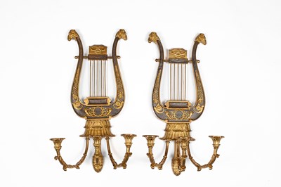 Lot 314 - A pair of Neoclassical style lyre-shaped wall lights