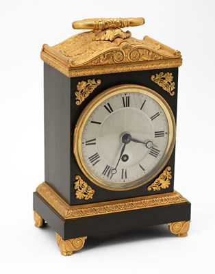 Lot 385 - A French bronze and gilt bronze mantel timepiece