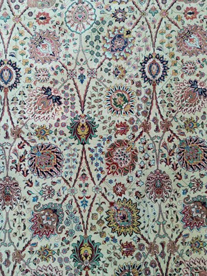 Lot 406 - A fine Tabriz carpet