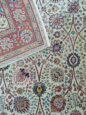 Lot 406 - A fine Tabriz carpet