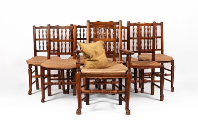 Lot 334 - A closely matched set of Victorian spindle back dining chairs