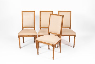 Lot 335 - A set of four oak framed dining chairs