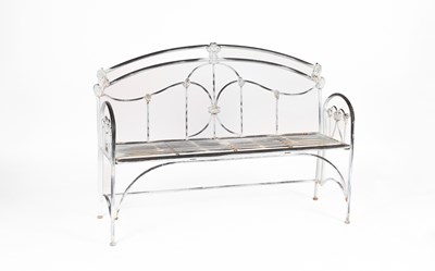 Lot 250 - A metal garden bench of folding design