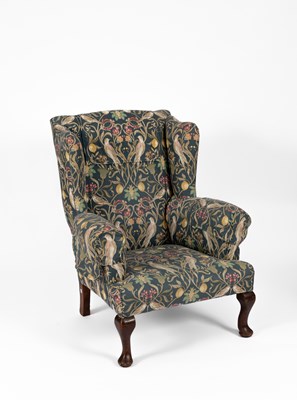 Lot 284 - An 18th Century style wingback armchair