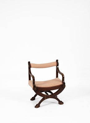 Lot 288 - An Empire style armchair