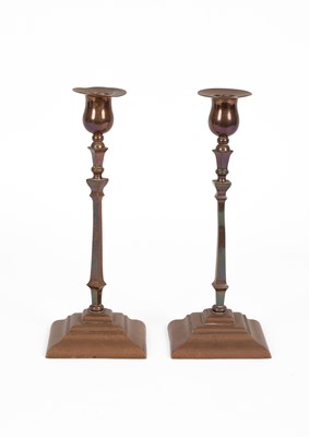 Lot 474 - A pair of copper candlesticks