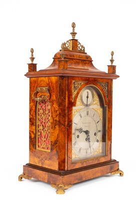 Lot 375 - A walnut veneered quarter chiming verge bracket clock
