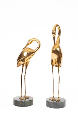 Lot 125 - A pair of brass cranes