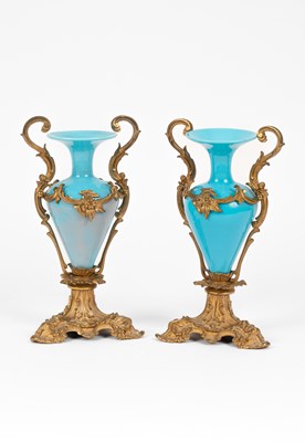 Lot 459 - A pair of turquoise glass and ormolu mounted vases