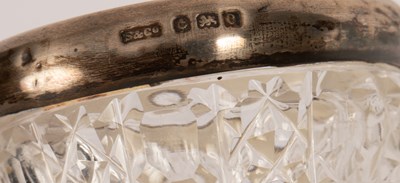 Lot 23 - Two glass scent bottles with silver collars