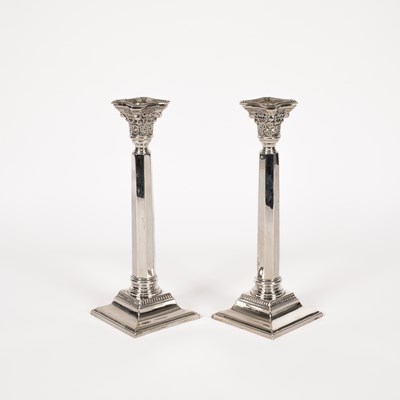 Lot 43 - A pair of silver candlesticks