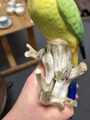 Lot 511 - Two Meissen porcelain parrots