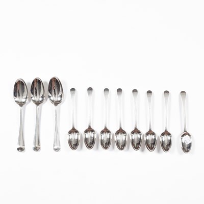 Lot 44 - A set of eight George III silver dessert spoons