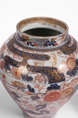 Lot 556 - A pair of Imari baluster vases and covers
