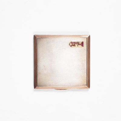 Lot 52 - An Art Deco silver cigarette case initialled in rubies