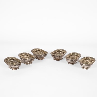 Lot 57 - A set of six George III silver and silver-gilt salts