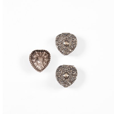 Lot 75 - Three Victorian heart-shaped silver boxes
